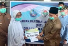 Bupati Pidie Jaya Salurkan BLT dan Sembako Untuk Masyarakat Terdampak Covid-19