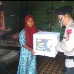 Baksos Brimob Aceh Bagikan Sembako kepada Warga Kurang Mampu di Lhokseumawe