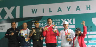 Foto : Atlet peraih medali emas, perak dan perunggu di kategori 25 M Rapid Fire Pistol Men. Foto : MC PON
